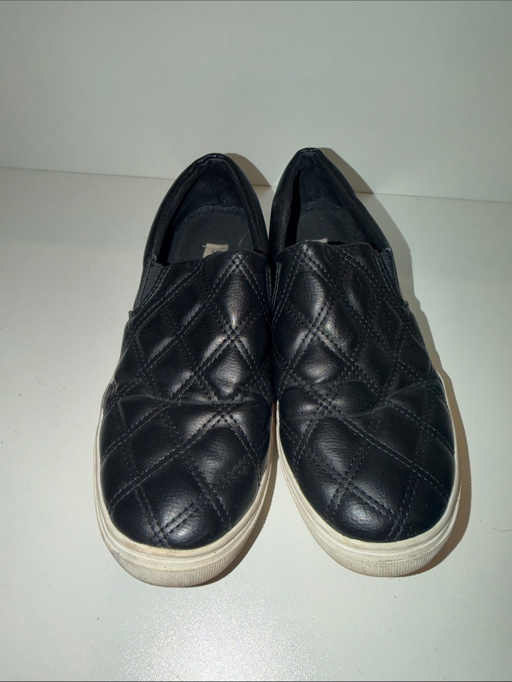 Steve Madden Black Quilted Slip-On Sneakers with White Soles